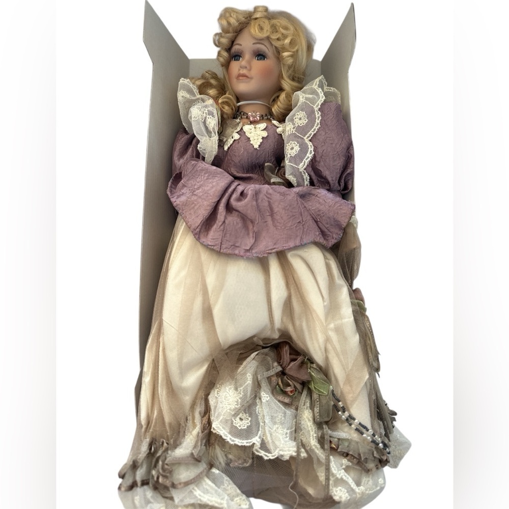 Elegant Porcelain Doll with Purple Dress Vintage
